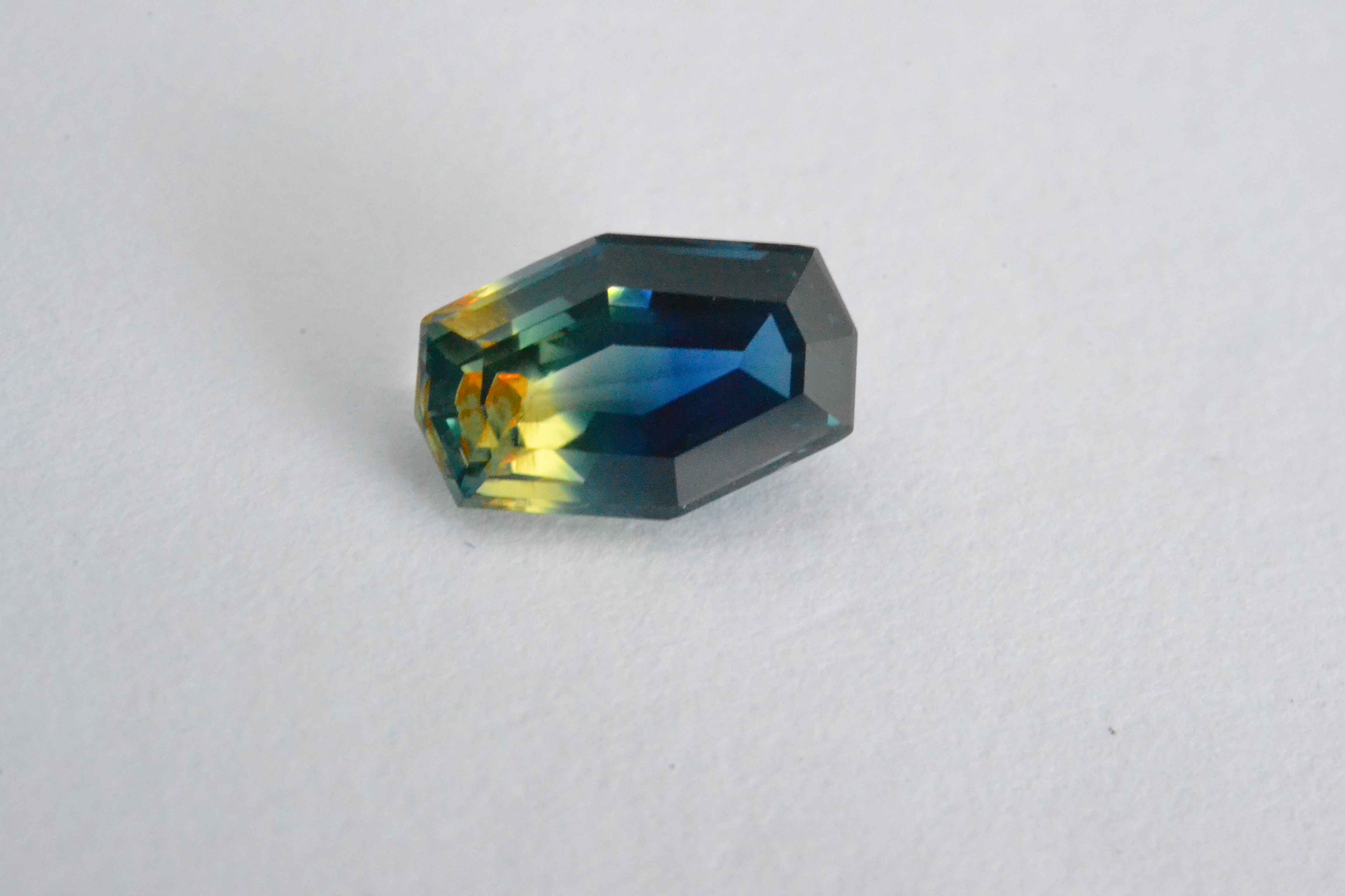 A rare fancy cut parti-sapphire with yellow and blue color zones. Courtesy Navneet Gems and Minerals