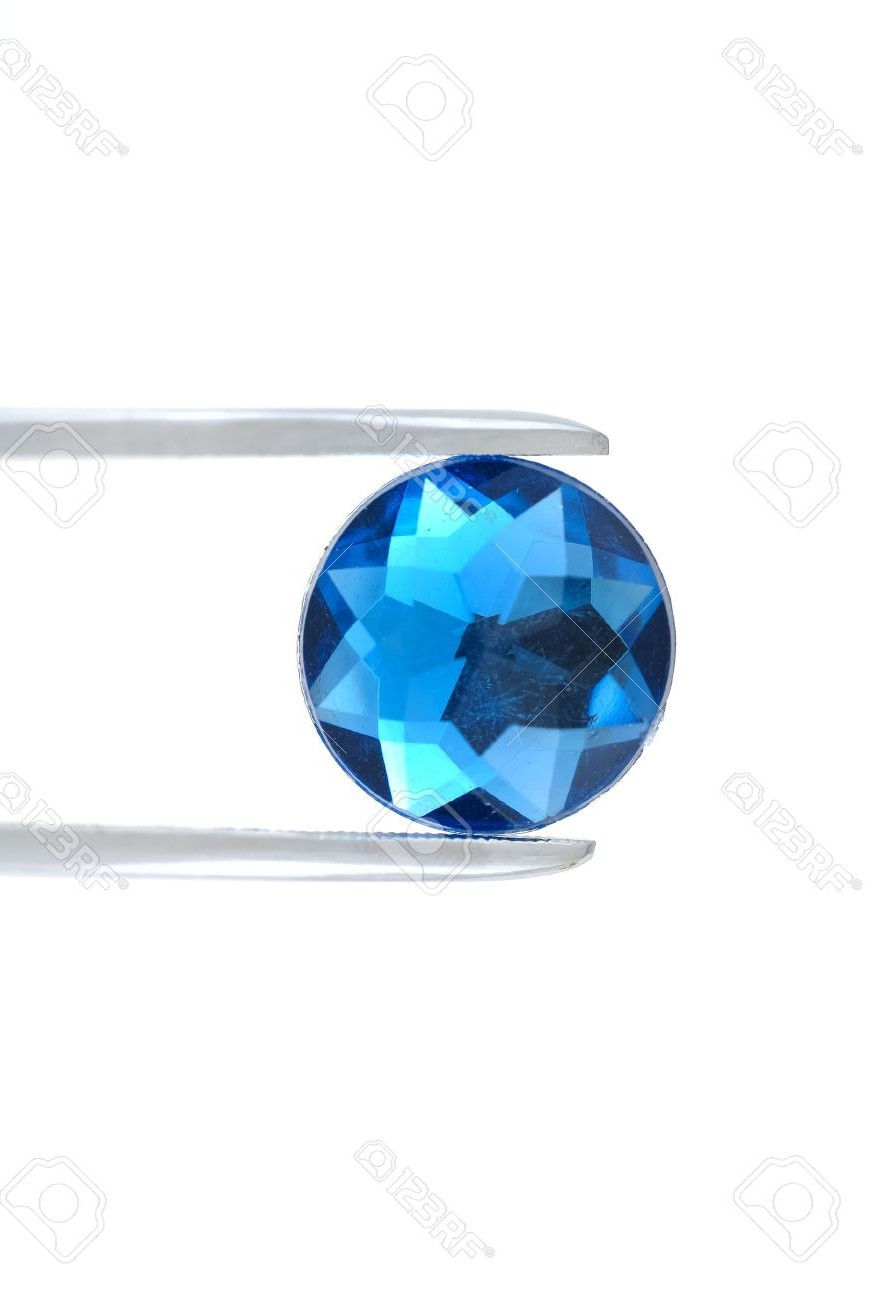 Gemstone held by tweezer
