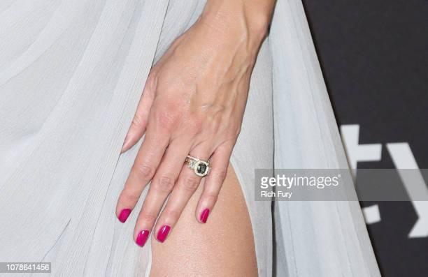 Klum’s 3-4.5 carat teal sapphire engagement ring